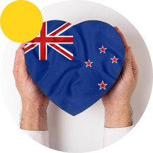 Heart shaped New Zealand flag held in hands